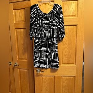 AB Studio Dress. Looks cute with a jean jacket and boots. Size L